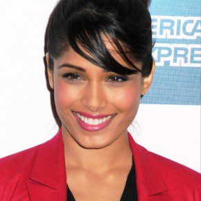 Freida Pinto Cute Black Loose Bun Updo With Side Swept Bangs