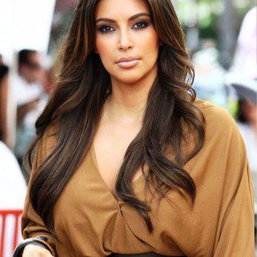 Kim Kardashian Layered Long Wavy Hairstyle