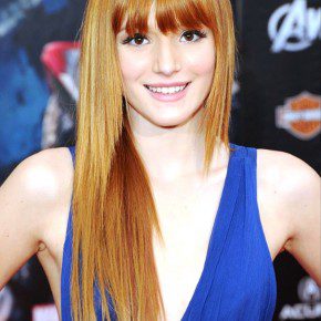 Long Sleek Copper Shimmer Hairstyle With Bangs