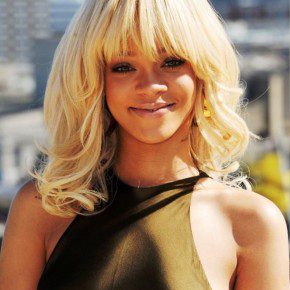 Rihanna Long Blonde Wavy Hairstyle With Bangs