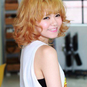 Short Curly Hairstyle With Cute Bangs