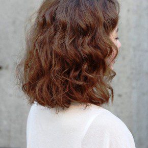 Short Red Curly Hairstyle