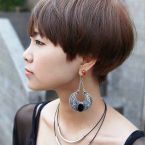 Side View Of Cute Short Haircut With Bangs