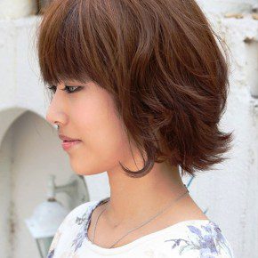 Side View Of Layered Short Brown Bob Hairstyle