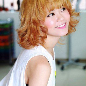 Sweet Short Blonde Curly Hairstyle With Bangs